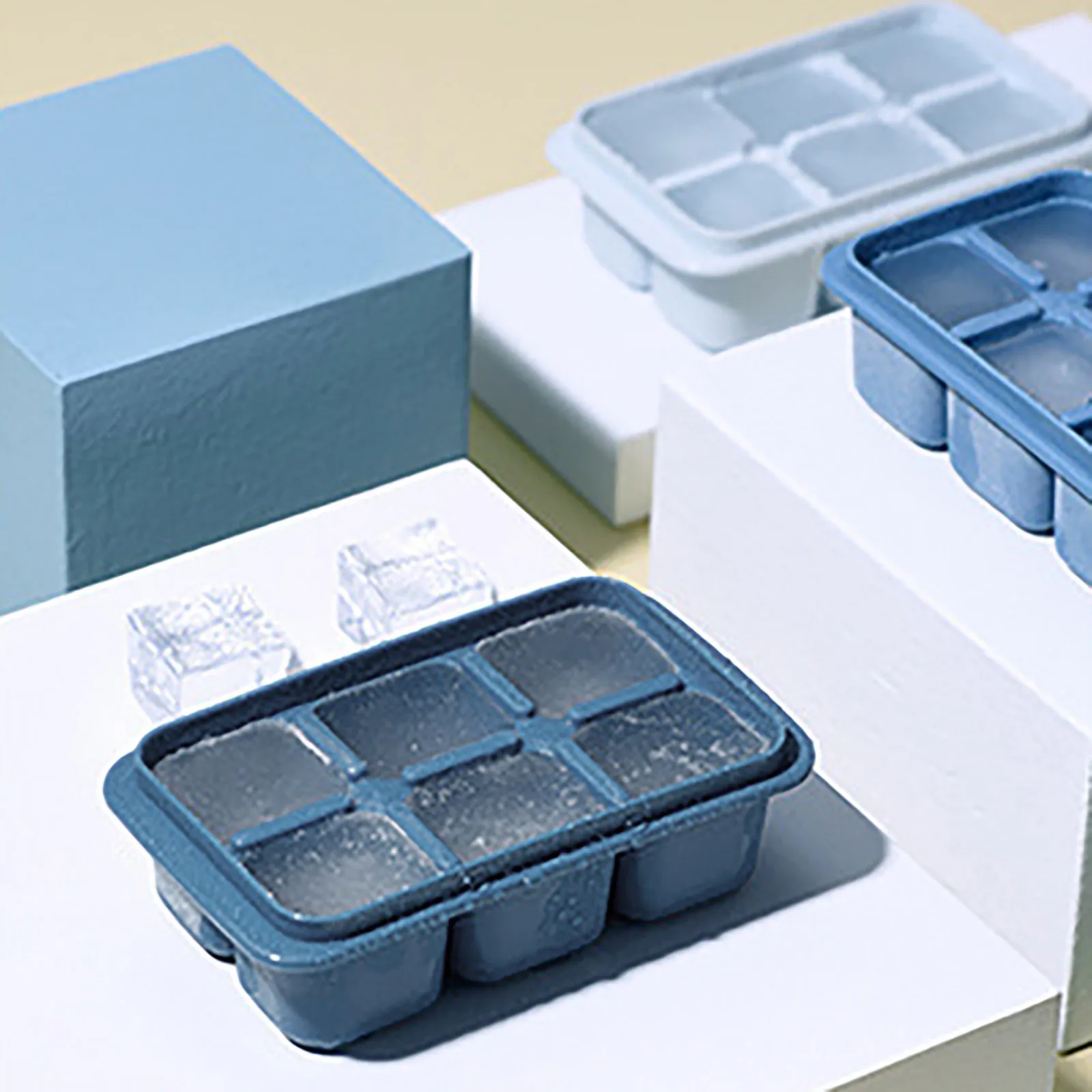 https://ae01.alicdn.com/kf/S42d032344fdd42e29ed4eb8765d4c533p/Silicone-Sink-Tray-Freezer-Ice-Cube-Tray-With-Lid-And-Storage-Box-Easy-Release-18-Pieces.jpg