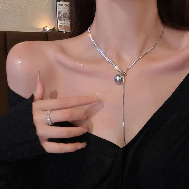 

Zircon pearl bead splicing titanium steel necklace fashion light luxury clavicle chain personality everything necklaces women