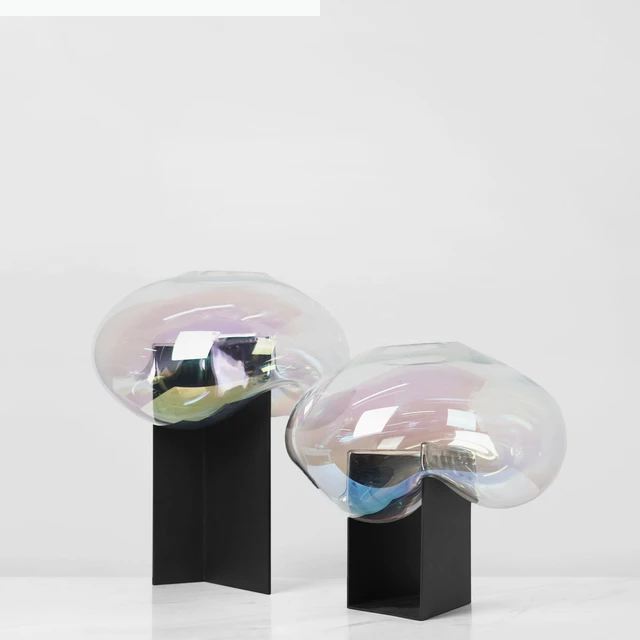 Iridescent bubble on a black base