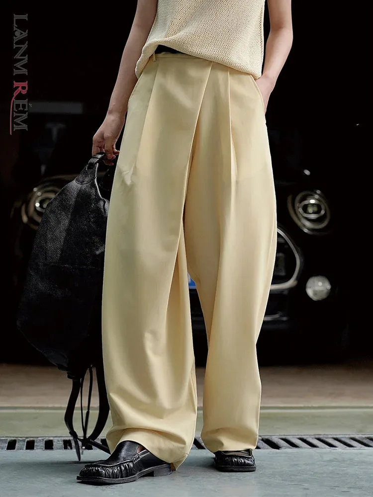 

[LANMREM] Minimalism Irregular Pleated Pants Women Solid Straight Wide Leg Pants Korean Style Clothing 2024 Summer New 26D2368