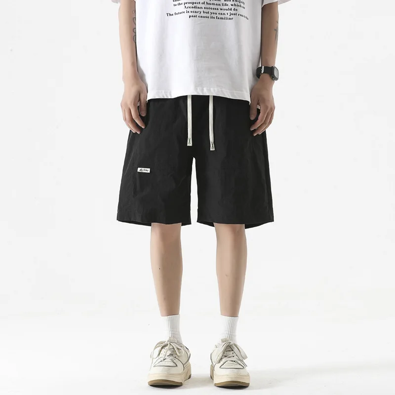 Large size casual shorts, quick drying and breathable capris, men's large size loose trendy casual sports ice silk pants