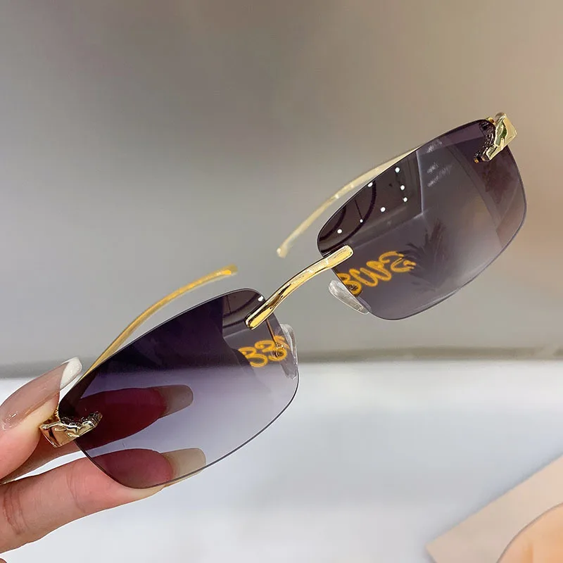 Stylish rimless rectangle sunglasses with tinted lenses and gold temples