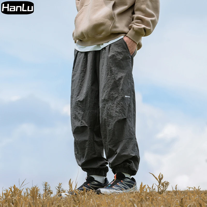 

Men's Autumn New Parachute Pants Loose and Casual Outdoor Japanese Street 3D Pleated Design Men's Pants