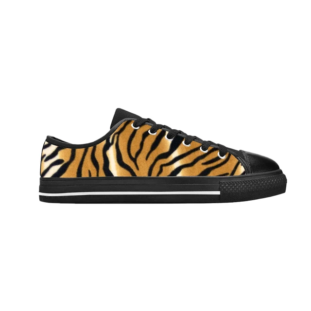 ASOS DESIGN Wide Fit Dizzy lace up sneakers in tiger print | ASOS