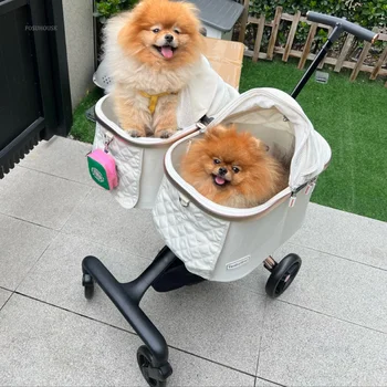 Cochecito ligero y multifuncional para perros y gatos pequeños.