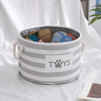 S43676376045841968a82d350471fd1adZ.png 1pc-A foldable striped pet toy basket and a dog toy storage box with a woven rope handle