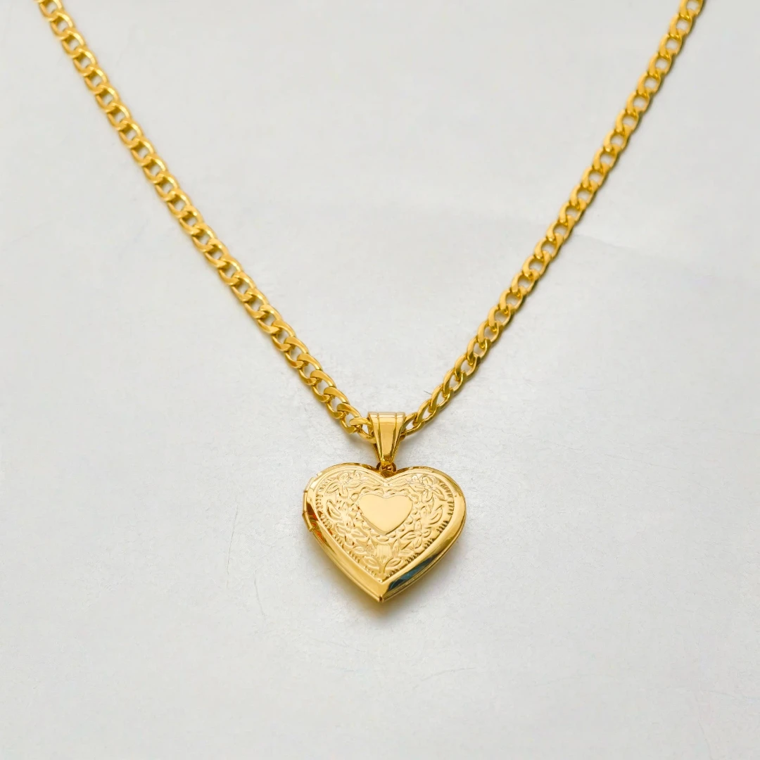 Open heart locket showing mini photo compartment