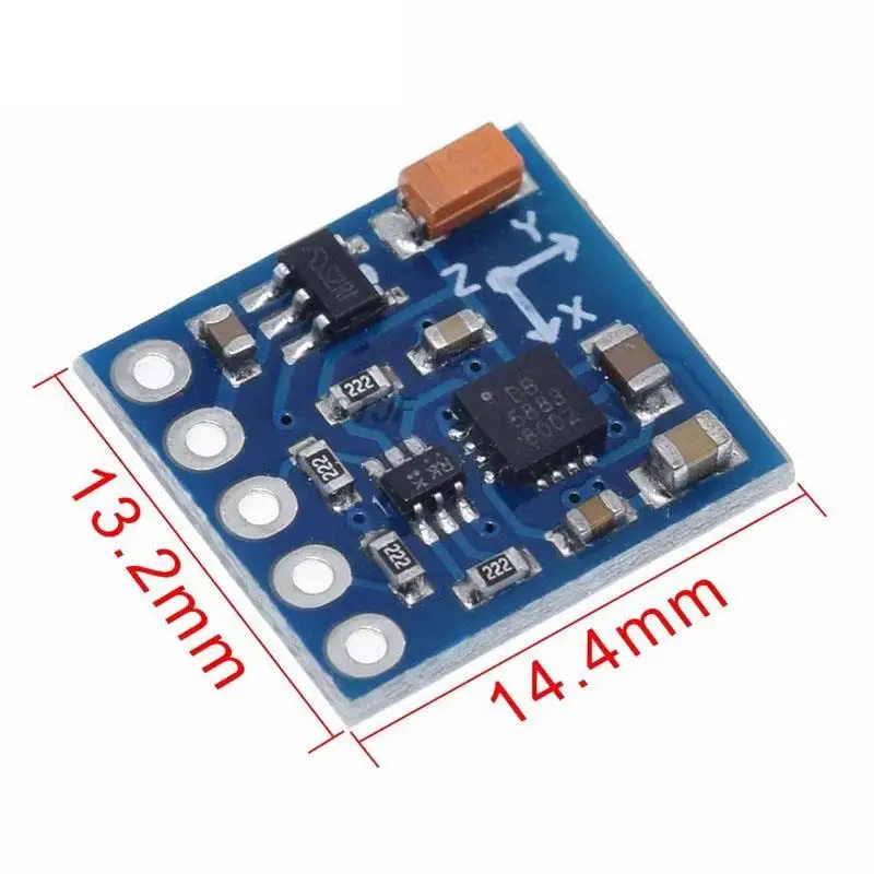 Module boussole électronique GY-271 QMC5883L placé sur une surface blanche, avec étiquette et composants visibles.