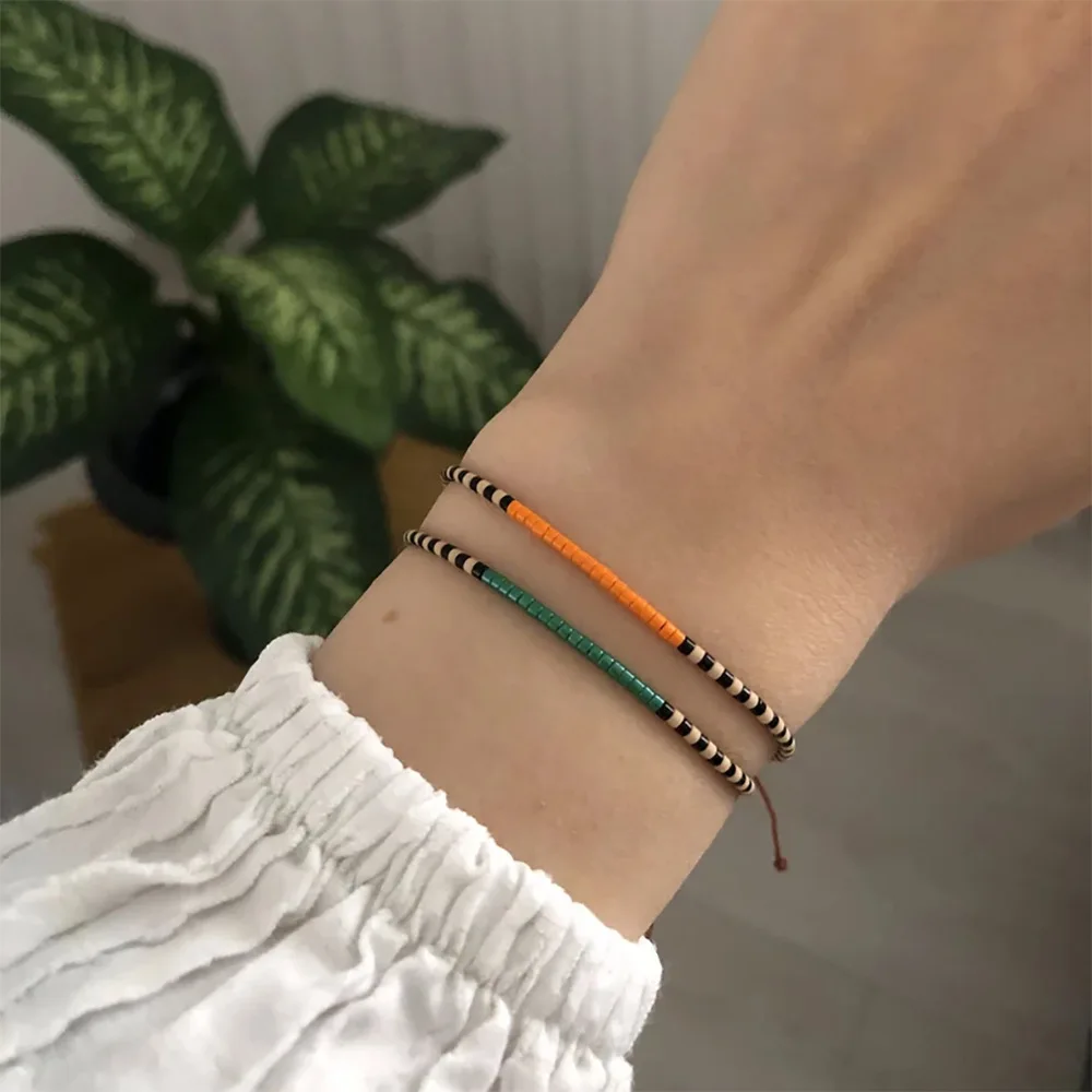 Braccale con perlne floreal n stle Loom - Modello Myuk Delca PB