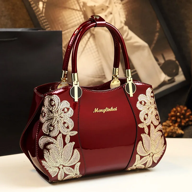 "Daiqi brand's 2026 new style women's handbags, single shoulder cross-body handbags, embroidered leather mother's bag"