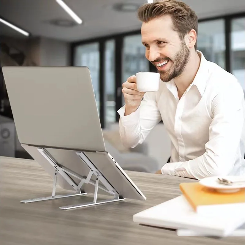 Sleek Adjustable Aluminum Portable Laptop Stand with Foldable Design and Non-Slip Cooling Support