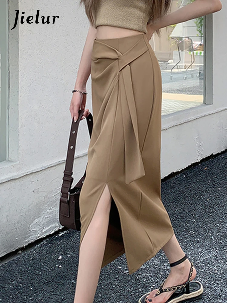 

Jielur Джилур новые нерегулярные женщины категории а Midi юбки Solid Color разделить шнурки с черными казуальными элегантные офисные леди летняя юбка