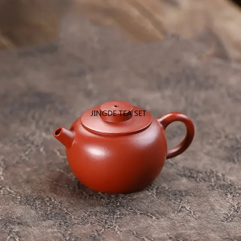 90ml Yixing Yixing purple clay teapot small capacity original ore red clay handmade Kung Fu tea set