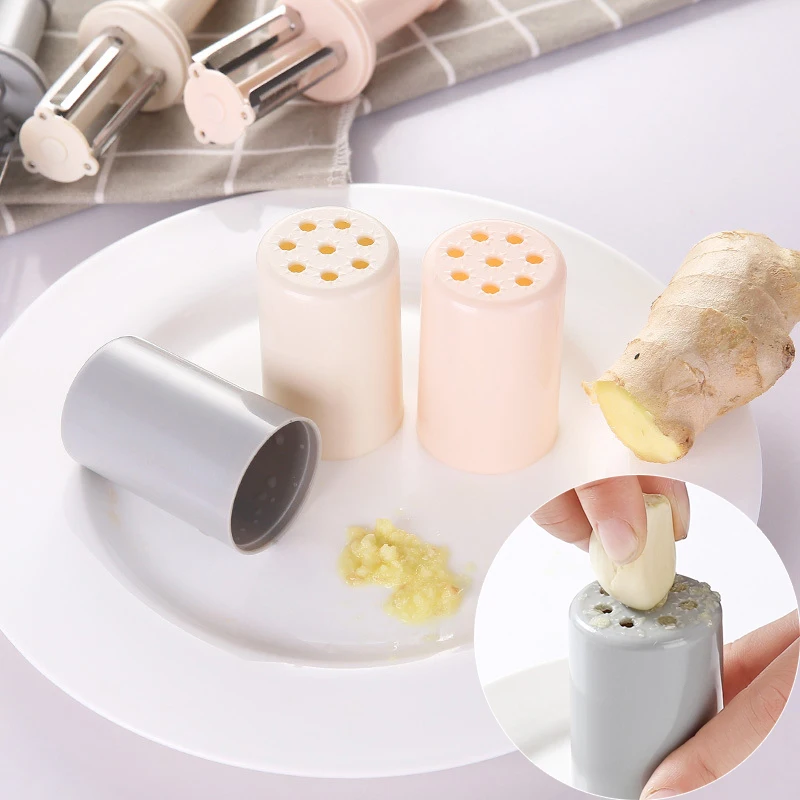 https://ae01.alicdn.com/kf/S43b5d45454634935900f7e7a847248a6R/3-Cutter-Head-Vegetable-Peeler-with-Lid-Julienne-Cutter-Multi-function-Garlic-Masher-Tomato-Potato-Carrot.jpg