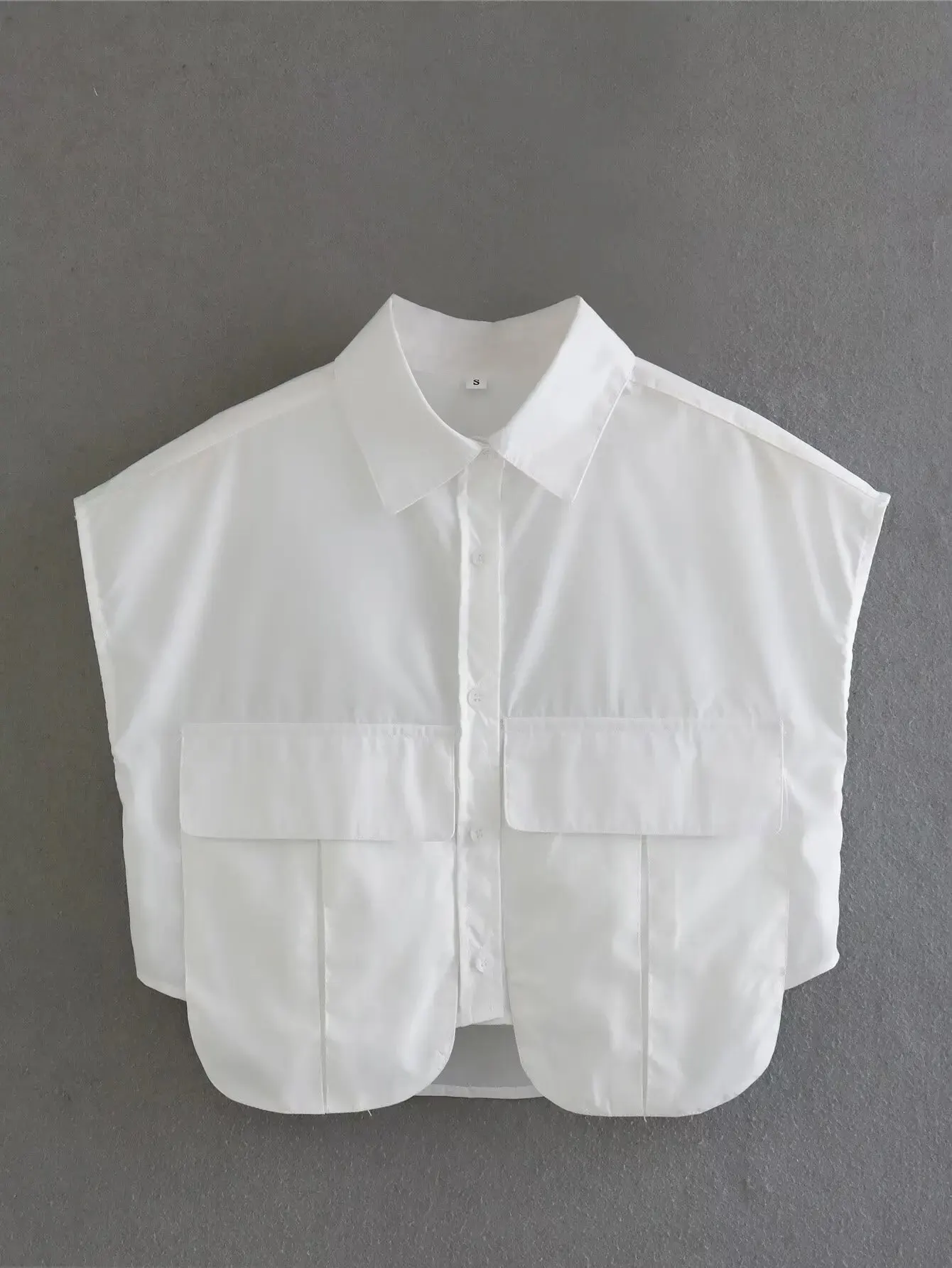 blusa blanca sin botones