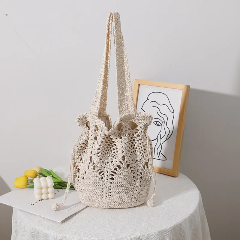 

Korean Version Of Cotton Woven Bag Female 2022 New One-Shoulder Hand-Held Fairy Flower Bucket Straw Bag Holiday Bag Tide