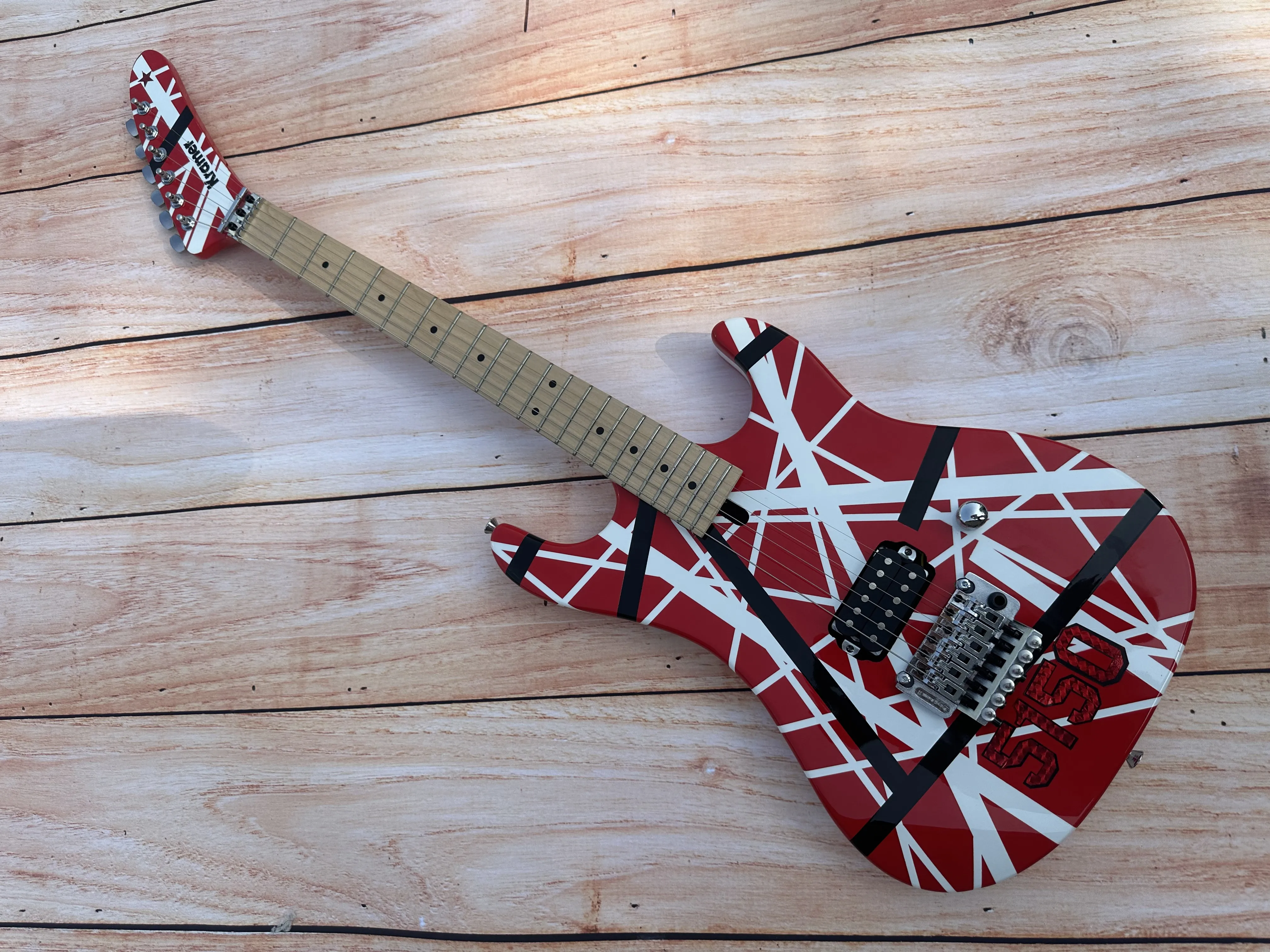 

5150 electric guitar, imported alder body, Canadian maple fingerboard, signed, classic red and white stripes, lightning package