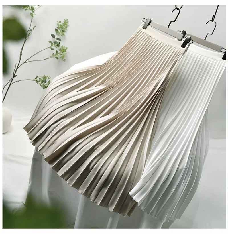 White skirt women's spring and autumn 2023 new high-waisted small mid-length pleated skirt with a high-grade drape