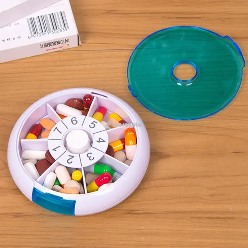 Compact Blue Rotating Pill Organizer - Travel-Friendly Weekly Medicine Case