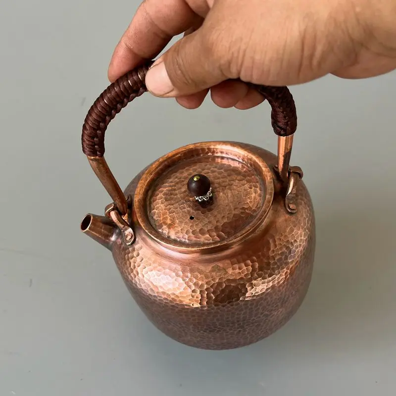 https://ae01.alicdn.com/kf/S43fc091ae6b24ab690aac30466e28388x/Pure-Copper-Water-Kettle-Induction-Cook-Retro-Teapot-Thick-Handmade-Lid-Handle.jpg