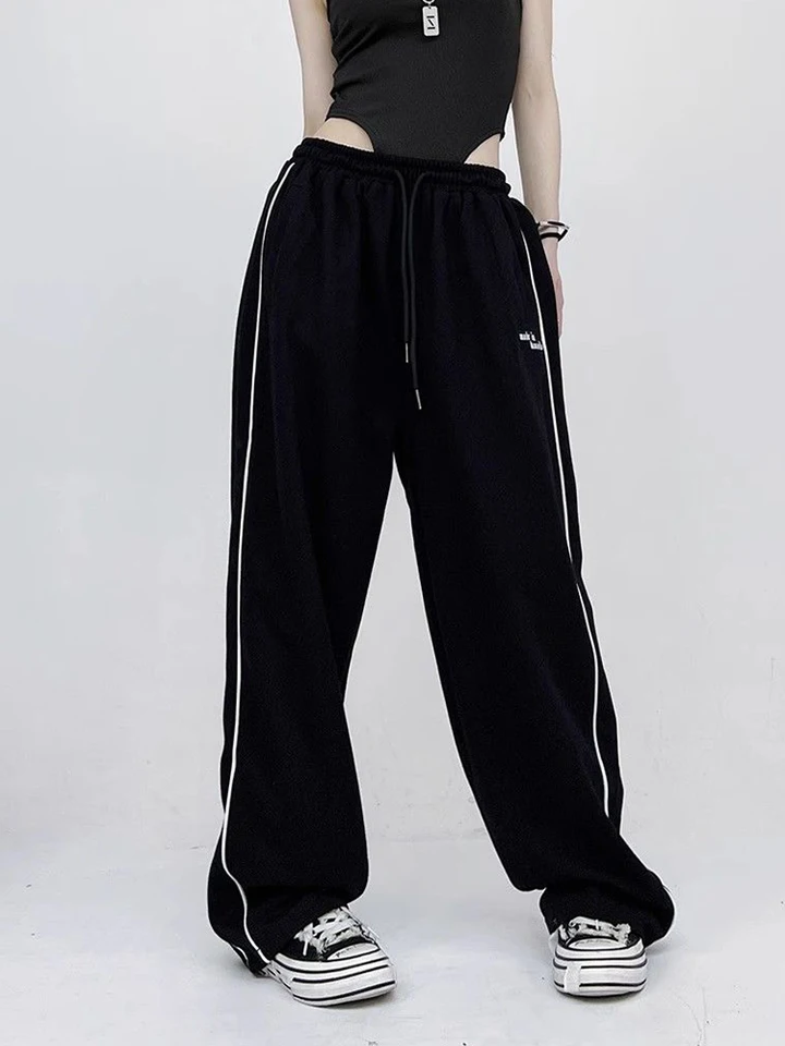 Pantaloni da donna a gamba larga con stampa a righe