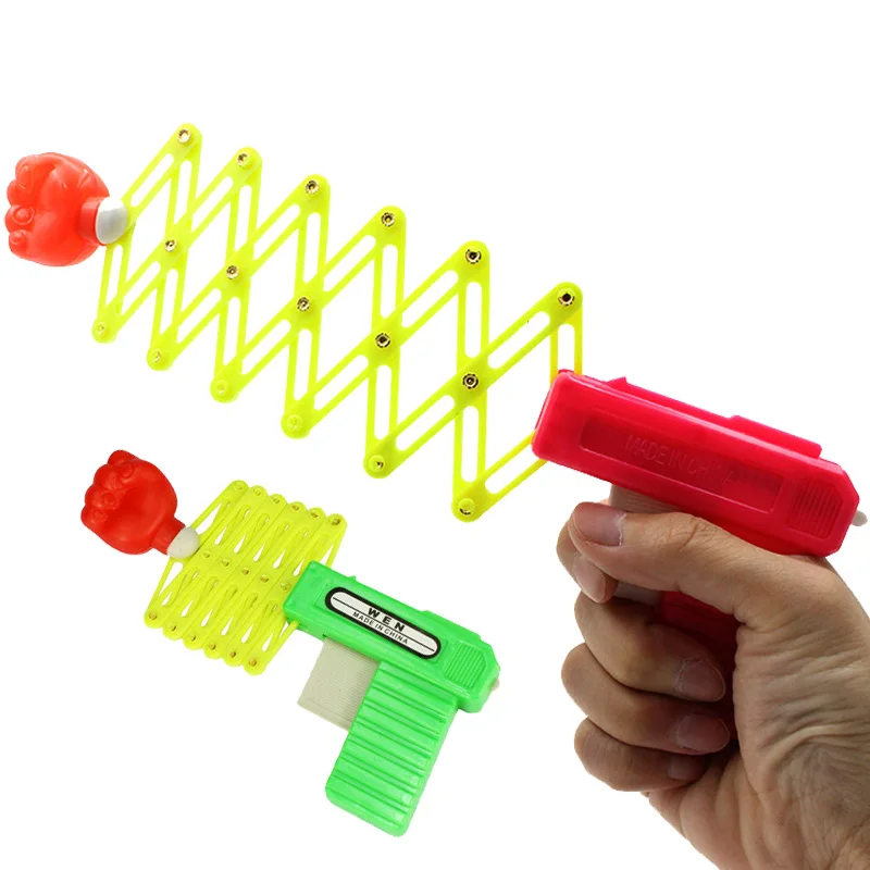 Classic Retractable Fist Shooting Trick Toy Gun Funny Gift Plastic Elastic  Telescopic Fist Toys for Children Kids Party Festival