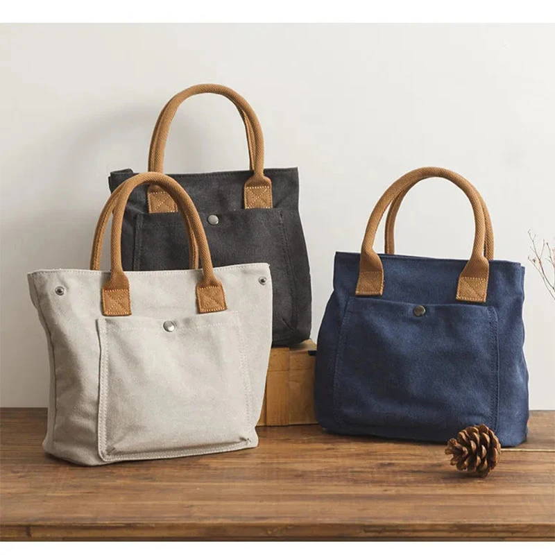 

2023 New Korean Handbag Zipper Hot Selling Canvas Carrying Bag Portable Canvas Women's Bag in Different Colors