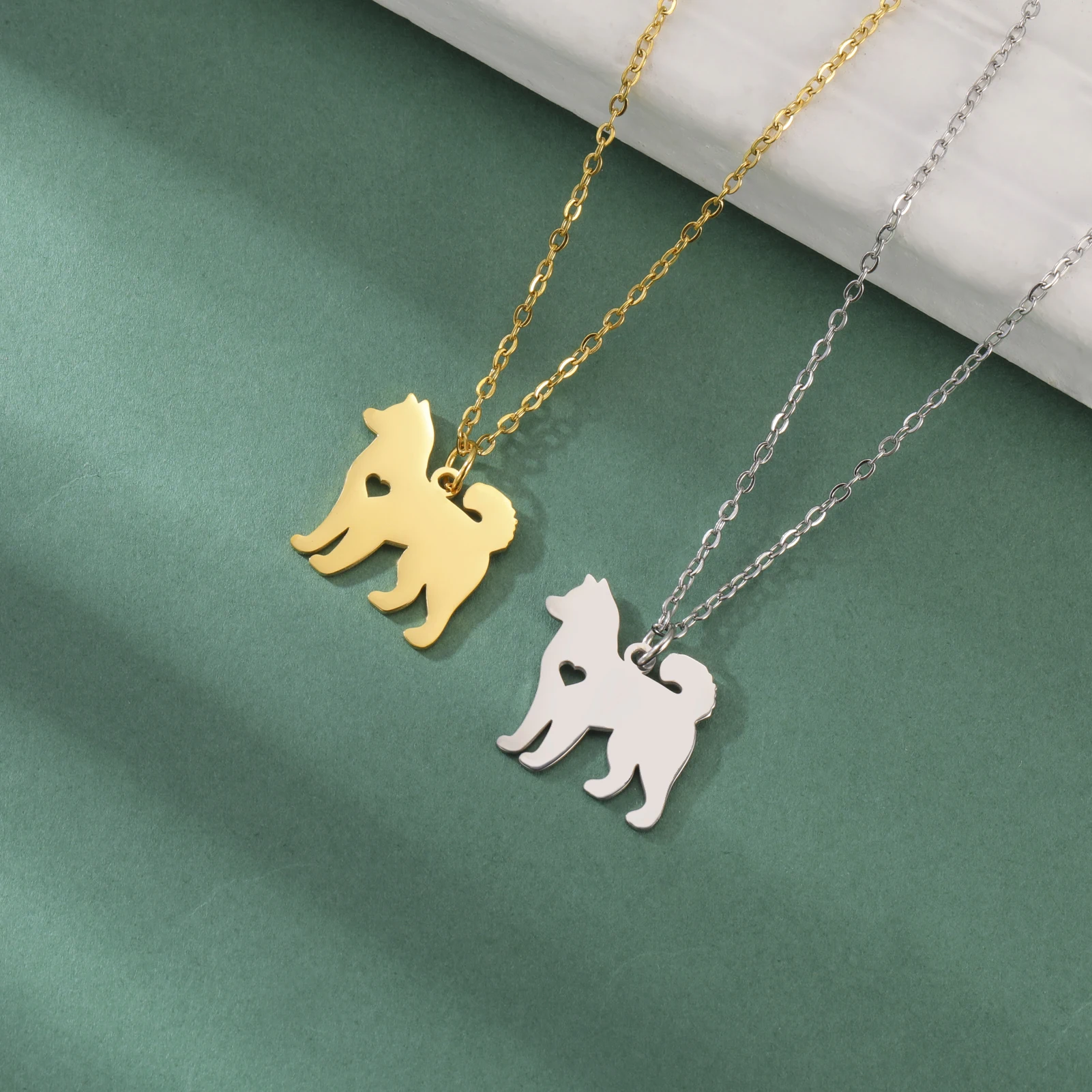 Samoyed pendant necklace on display