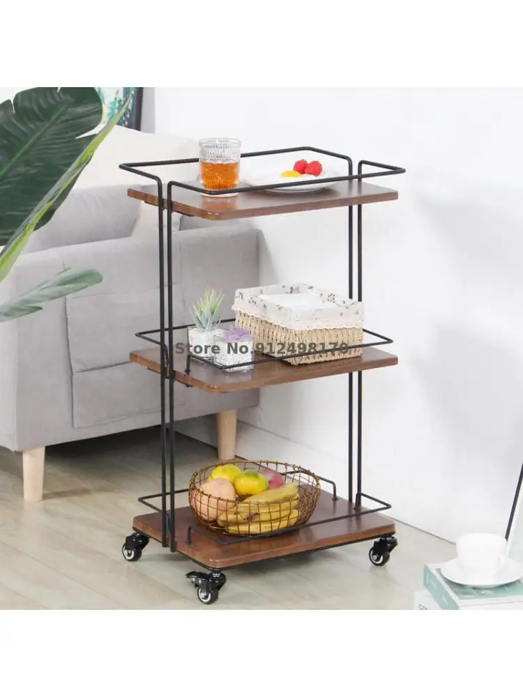 A few corners on the side of a Japanese sofa, a movable iron dining car, multi-layer rack, kitchen storage rack, living