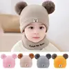 Soft bear ear beanie for kids, warm and cozy winter hat, perfect for children’s outdoor winter wear, available in multiple colors.