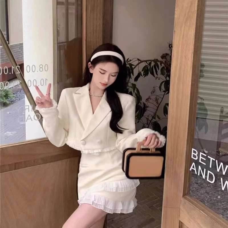 Conjunto de falda de dos piezas de lujo para mujer, chaqueta corta con solapa y volantes, minifalda ajustada de retazos, moda coreana, otoño