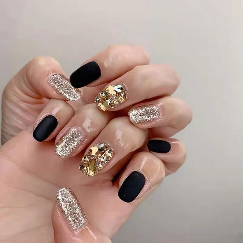 Black And Gold Glitter Nails