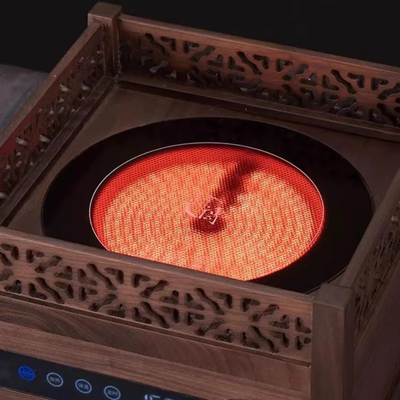Making tea around the stove walnut wood electric ceramic stove tea boiler boiling water boiling teapot