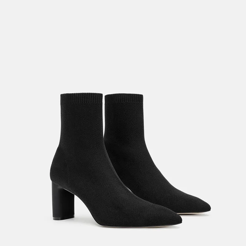 Black stretch socks boots in chunky knitted Martin boots with high