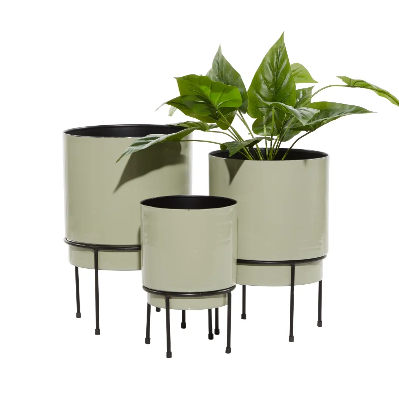 

The Novogratz 10", 13", 14"H Indoor Outdoor Gray Metal Planter with Removable Black Stand (3 Count)