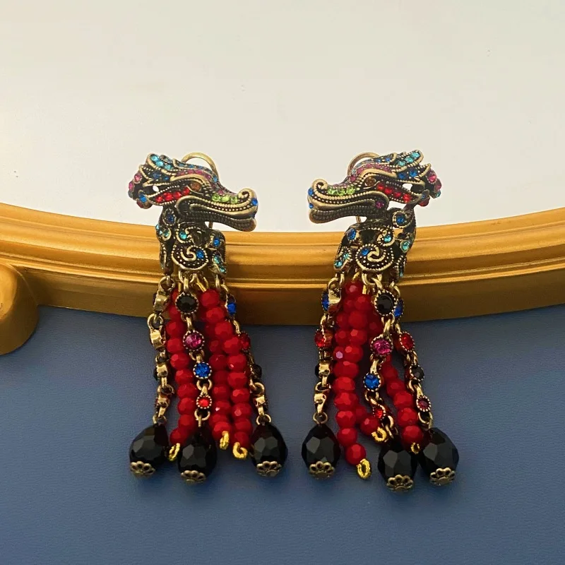 

Fashionable palace style personalized dragon design with gemstone tassel earrings