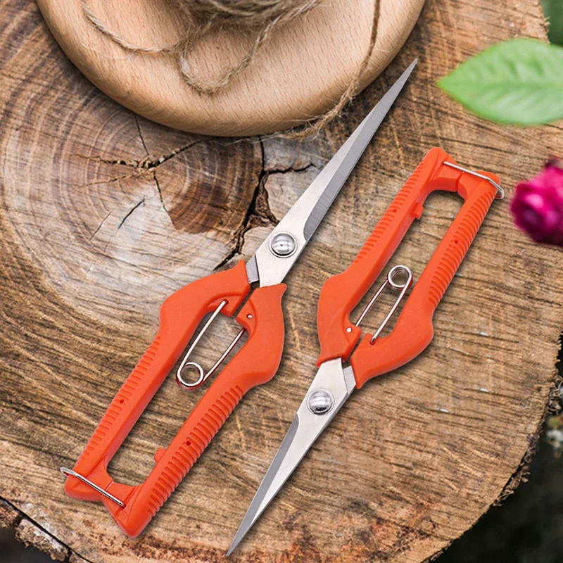 Side view of orange grape pruning shears showing ergonomic handle