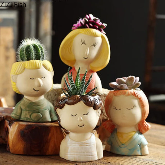 Cactos adorável dos desenhos animados e plantas em vasos