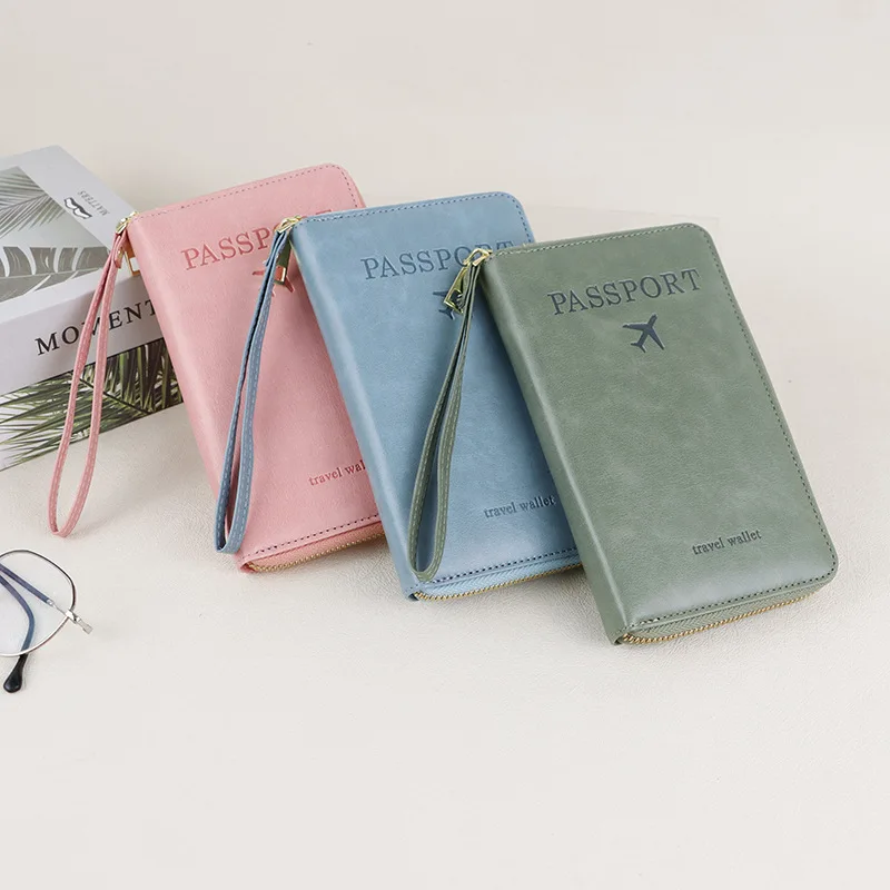 RFID blocking leather passport cover, suitable for women's large capacity travel wallets with multiple card slots