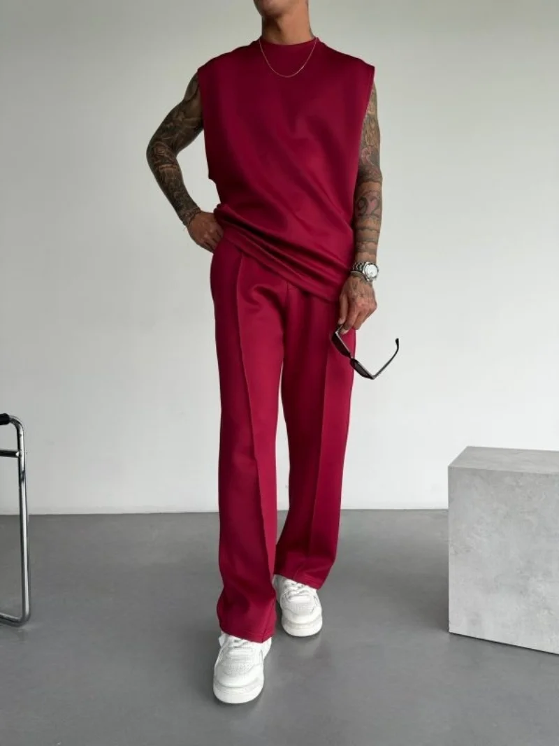 Men’s solid color casual style pants featuring an elastic waistband with drawstring red