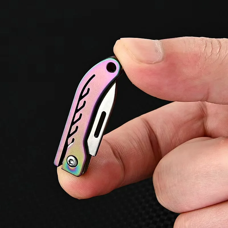 Titanium Alloy Mini Folding Knife Made of High Hardness Steel for Quick Opening, Portability, and Strong Practicality 2
