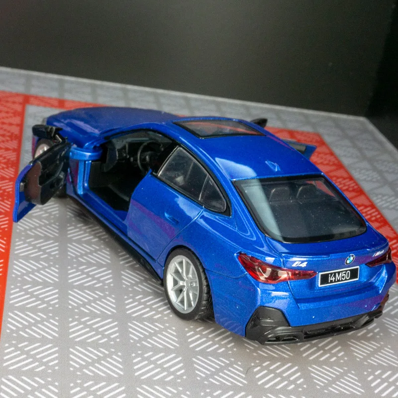 1:34 BMW I4 M50 Supercar Alloy Model Car Toy Diecasts Metal Casting Sound and Light Car Toys For Children Vehicle