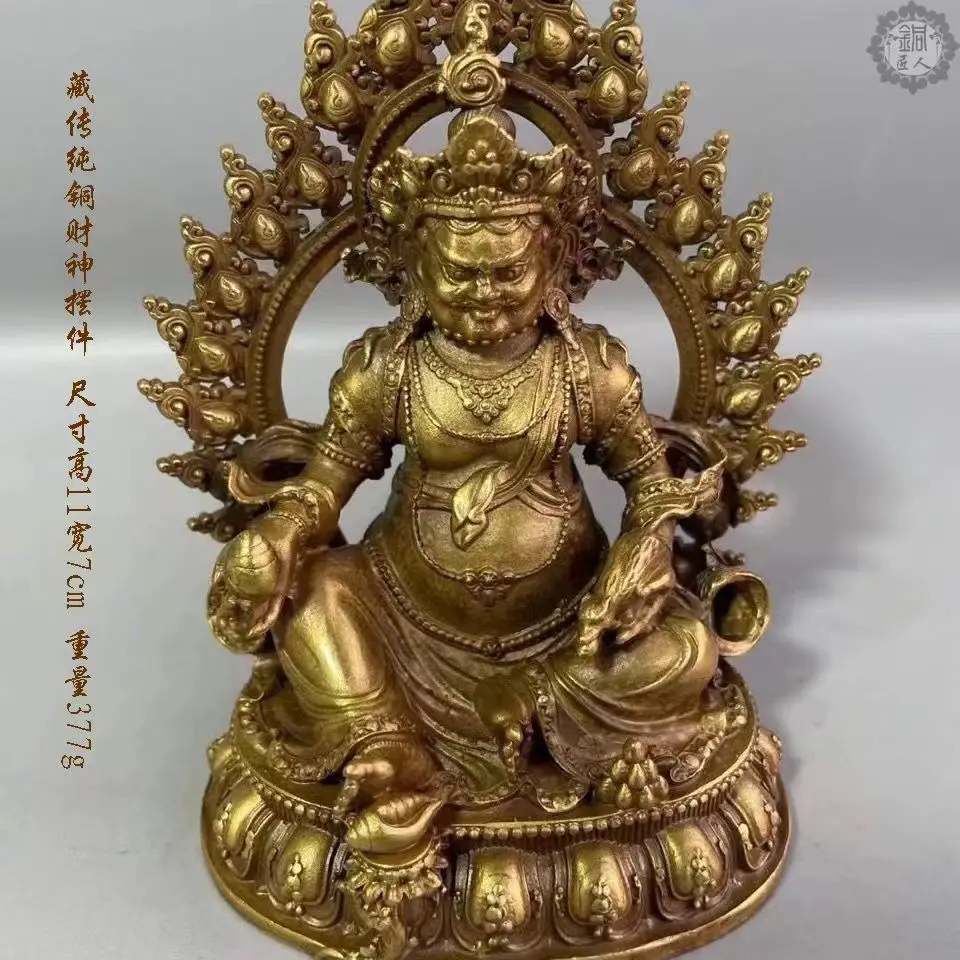 

Bronze and yellow Buddha statues of the God of Wealth in Nepal, Tibetan Tantra Buddhist protection Zangbara for home worship