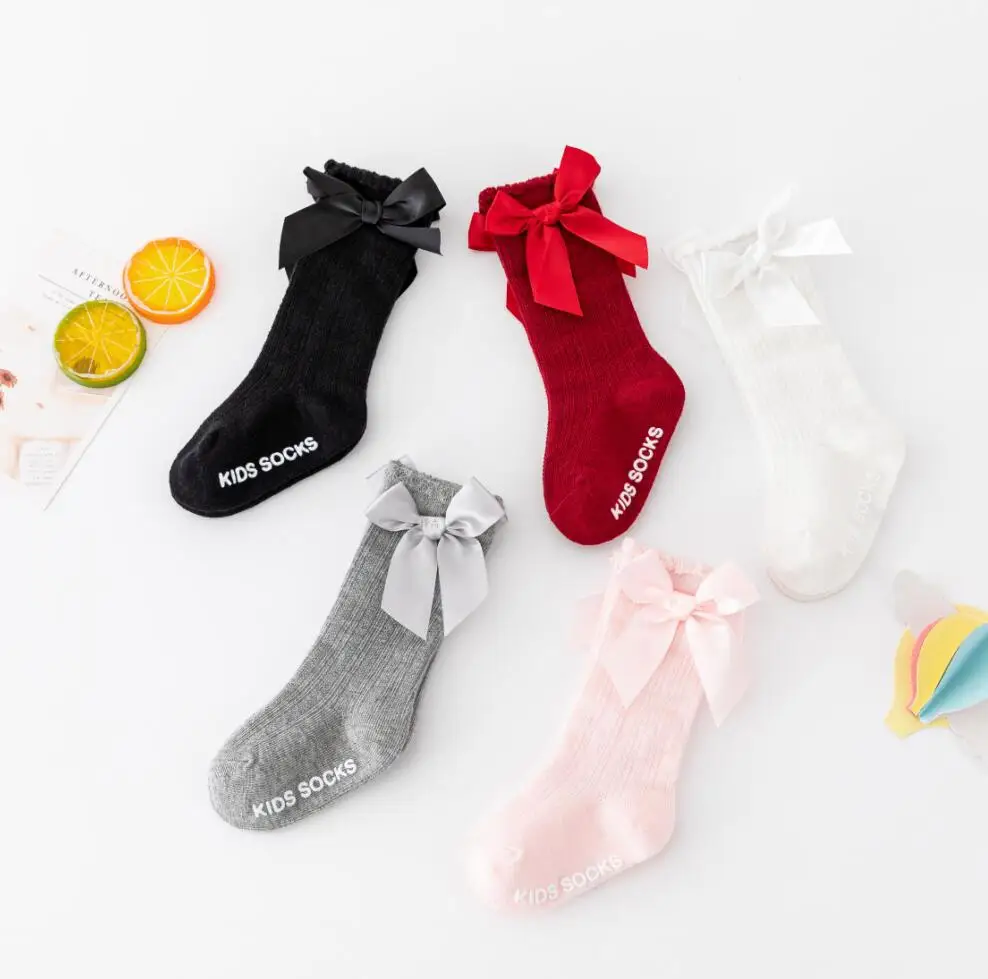 

New girls solid color striped stockings cotton non-slip bow baby socks