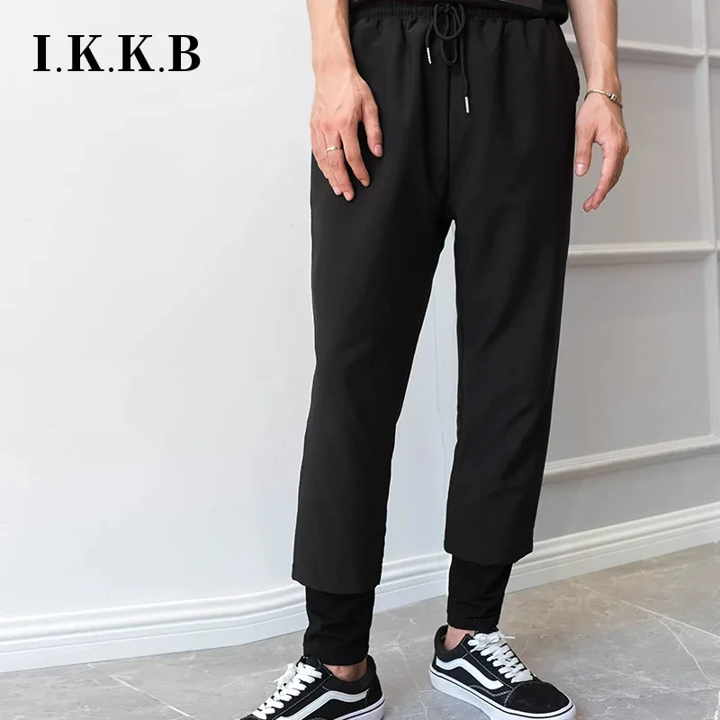 

M-4XL spring and autumn models fake two-piece pants men's wide-leg Japanese tide loose nine-point casual pant