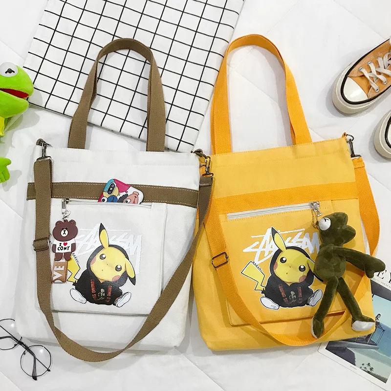 

Pokemon Ladies Fashion Canvas Small Square Bag Korean Version Multifunctional Cute Pikachu One-shoulder Diagonal Mobile Package