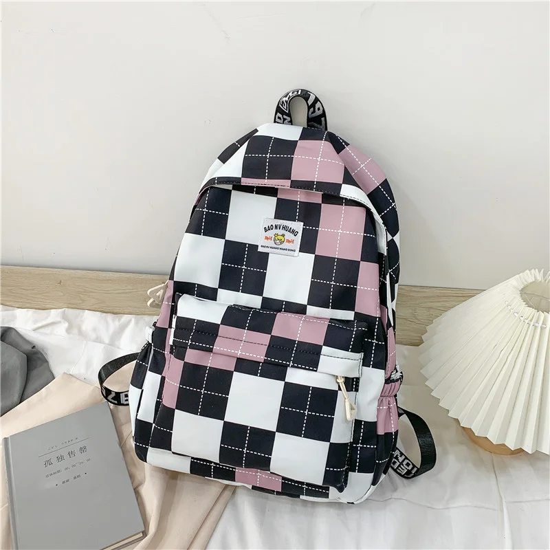 

Schoolbag female college student high face value simple and lovely girl lattice Korean high school student ins Backpack