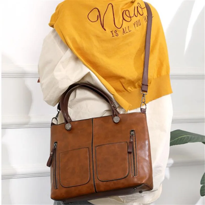 Retro leather handbag with two zipper pockets, versatile tote and crossbody style, classic women’s work and business bag. 45120