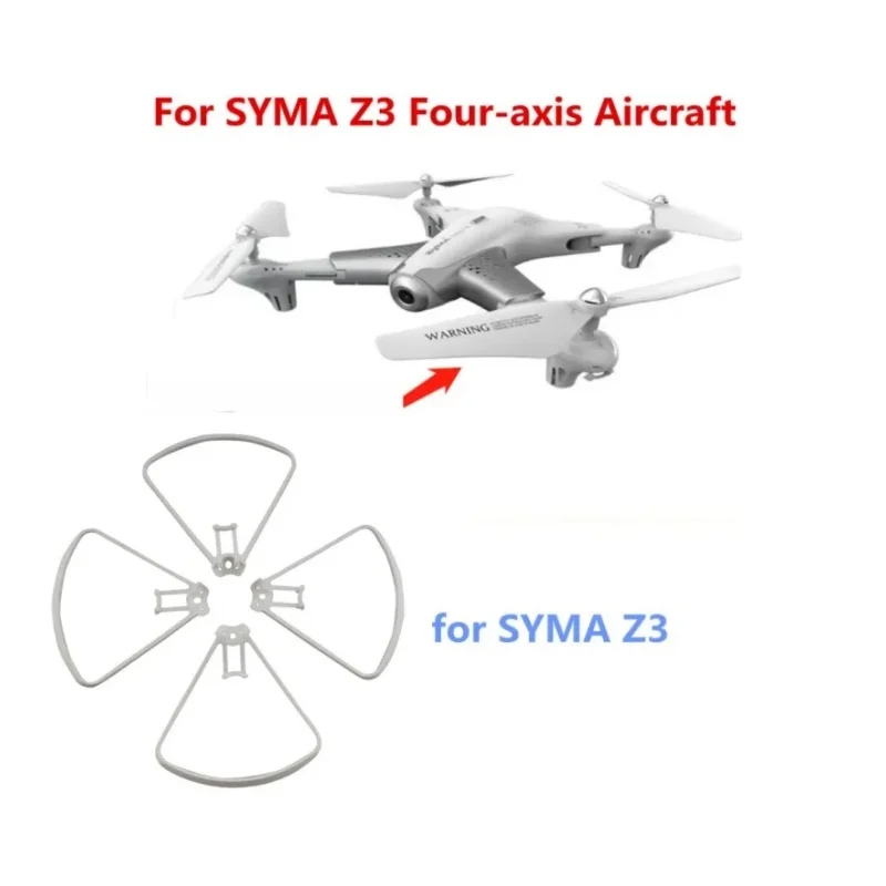 Protections d'hélice SYMA Z3 en main, montrant leur taille compacte et leur matériau ABS robuste.