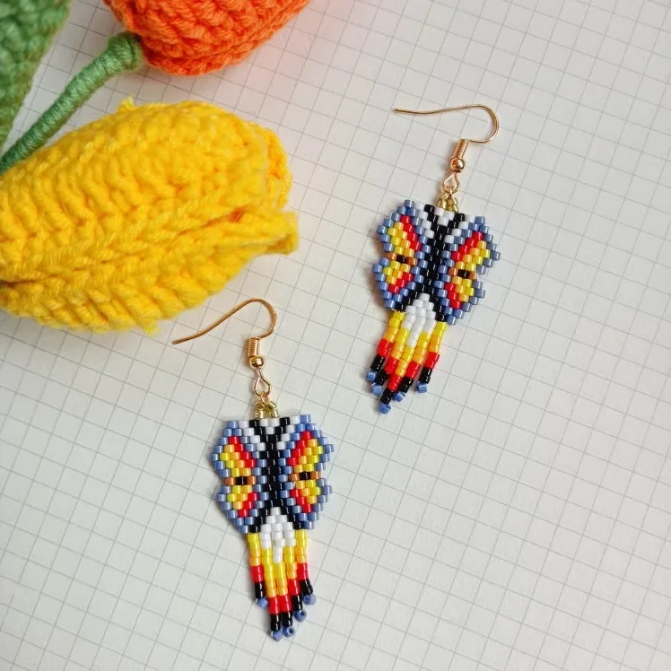 

Rice bead earrings The butterfly Tassel Personality Fashion Contracted Creative Hand woven Bohemia Female Alloy Beaded earrings